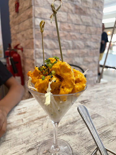 Shop # NKM-E-024, 2nd floor, next to food court, Nakheel Mall, Palm - Dubai