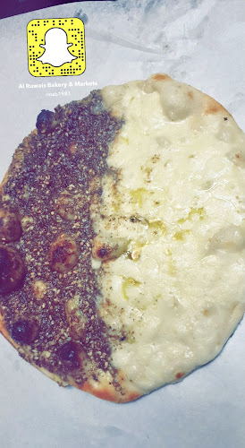 AL RUWAIS MARKETS & AUTO BAKERIES.أسواق ومخابز الرويس الأوتوماتيكية - Abu Dhabi