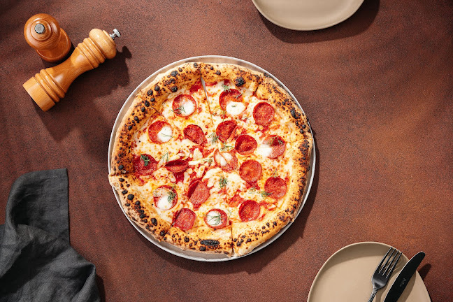 Moon Slice Pizza Dubai - Hospitality and gastronomy