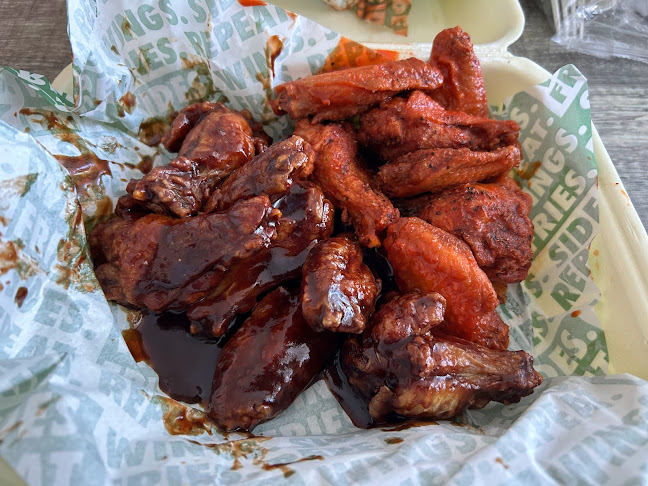 Wingstop Khalifa City - Hospitality and gastronomy