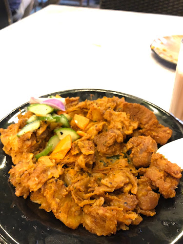 Kadooli Tea Palace - Hospitality and gastronomy