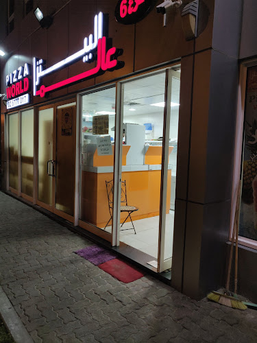 عالم البيتزا فرع شارع الدفاع