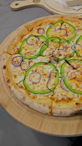 Opinii despre HomeMadePizza Restaurant în Sharjah - Hospitality and gastronomy