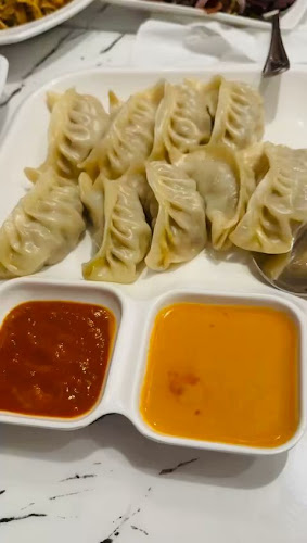 Opinii despre MomoStreet Restaurant - Al Nahda Dubai în Dubai - Hospitality and gastronomy