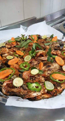 الطاحونة الحمراء لبيع وشوي الاسماك