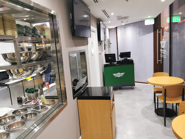 Wingstop Zawaya Walk - Hospitality and gastronomy