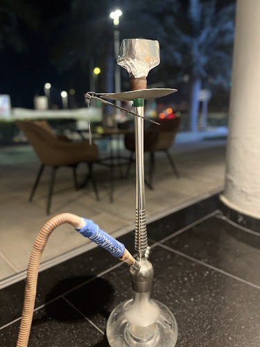 Rain windy cafe - Abu Dhabi