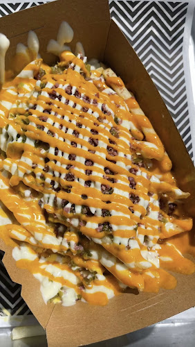 Burger28 - Nad Al Hamar - Hospitality and gastronomy