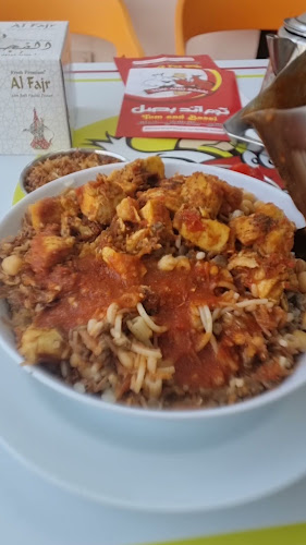 koshari tom and basal كشرى توم اند بصل ابوظبي - Abu Dhabi