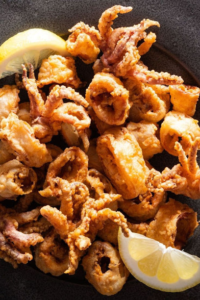 الطاحونة الحمراء لبيع وشوي الاسماك