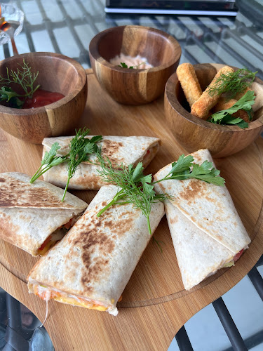 Rain windy cafe - Abu Dhabi