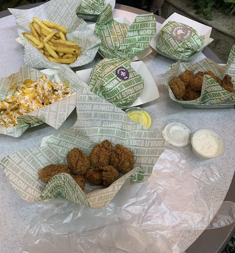 Comentarii opinii despre Wingstop Zawaya Walk