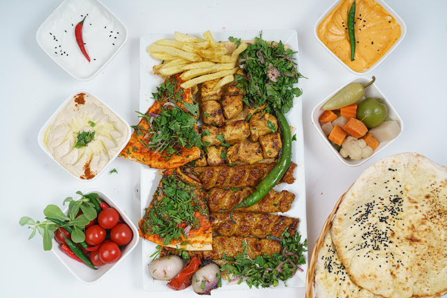 مطعم ومعجنات ومشاوي الحاره الشامية Al Hara Al Shamiya Restaurant and Grills
