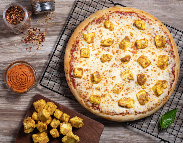 Opinii despre Chicago Pizza & More - Burjuman Mall Dubai | Best Pizza in Dubai în Dubai - Hospitality and gastronomy