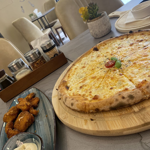 HomeMadePizza Restaurant - Hospitality and gastronomy